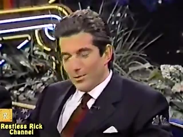 Poster frame from JFK Jr. Rare 1998 TV Interview